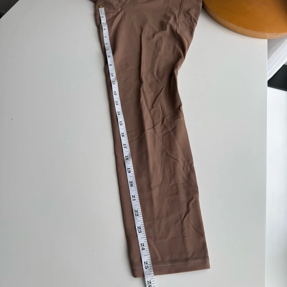 Athleta Salutation Stash Tight Size Large